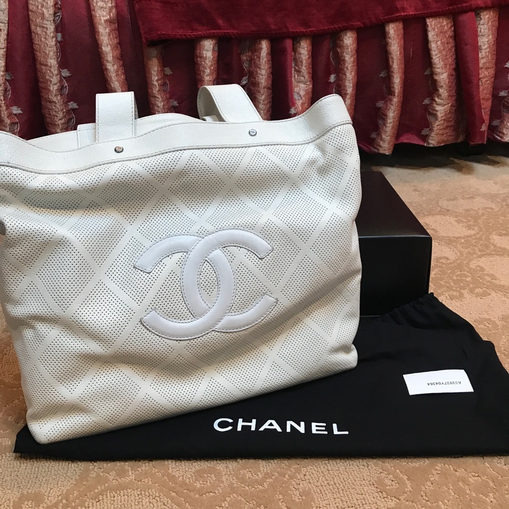 Chanel white perforated tote with handles and CC